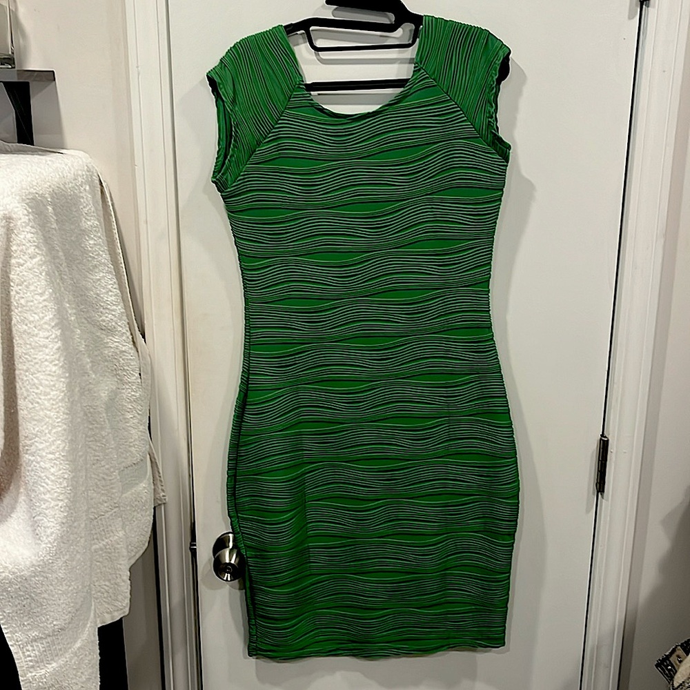 Green dress size large 100 polyester by Taydey never worn with tag